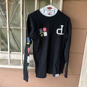 Diamond men’s t shirt with emblems on both arms. Black men’s size medium
